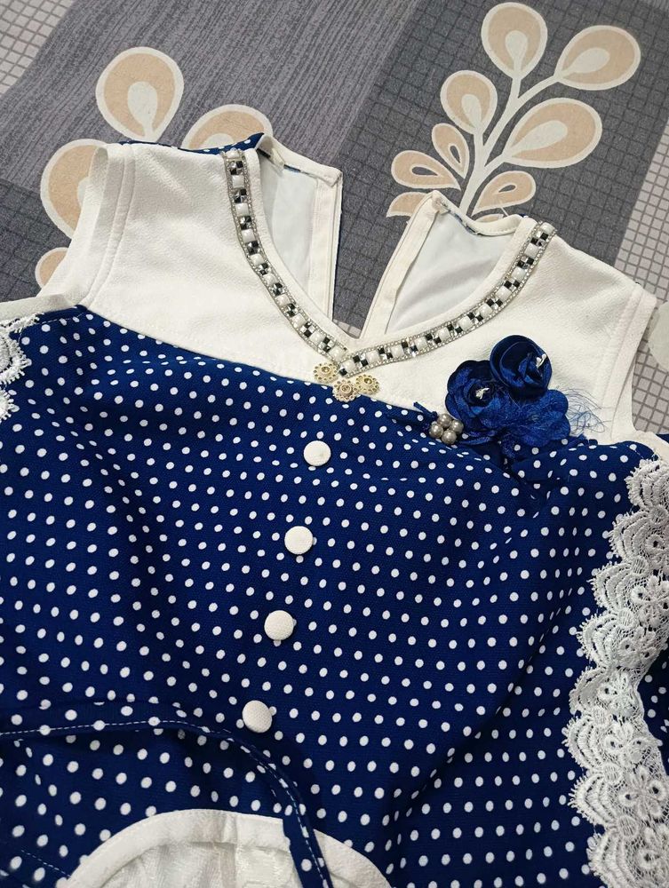 Adorable Blue Polka Dot Dress with Embellishments