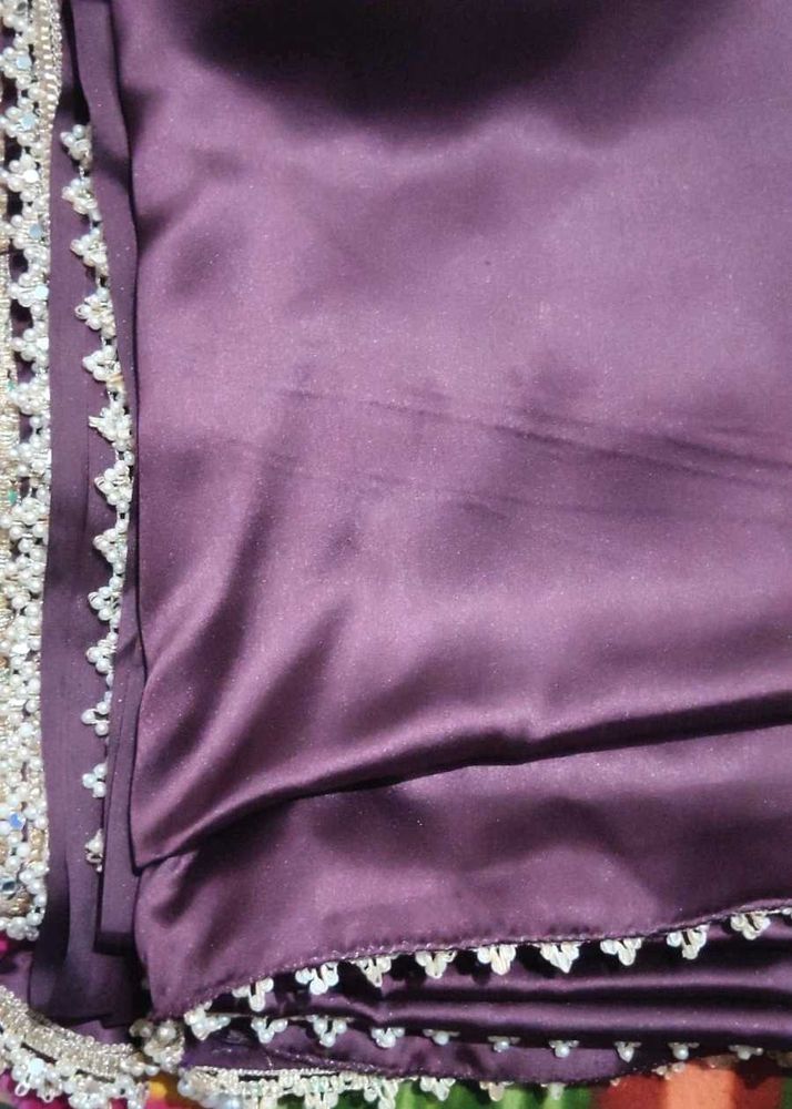 Elegant Plum Saree with Pearl Detailing