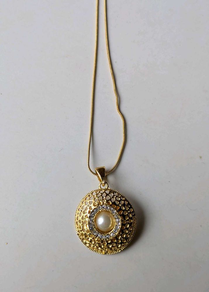 Elegant Gold Tone Pendant
