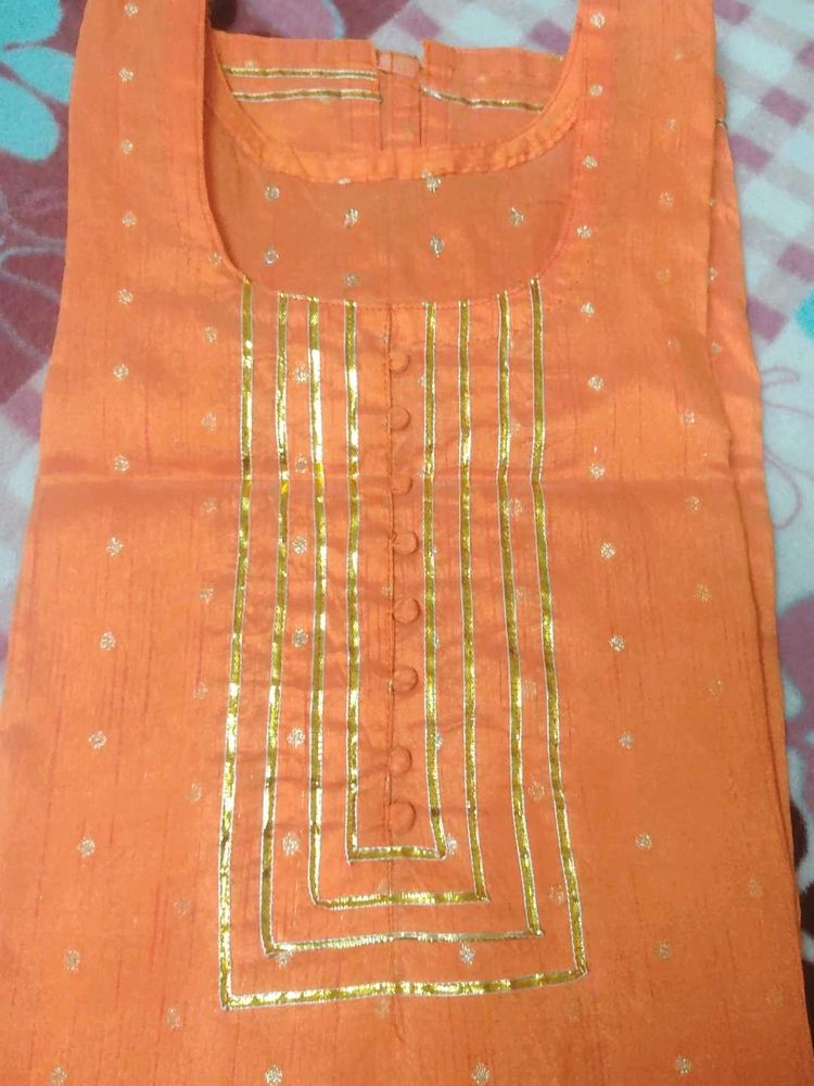 Vibrant Orange Kurta with Gold Embellishments