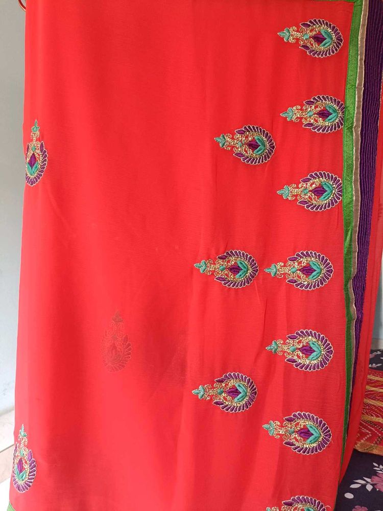 Elegant Embroidered Orange Saree