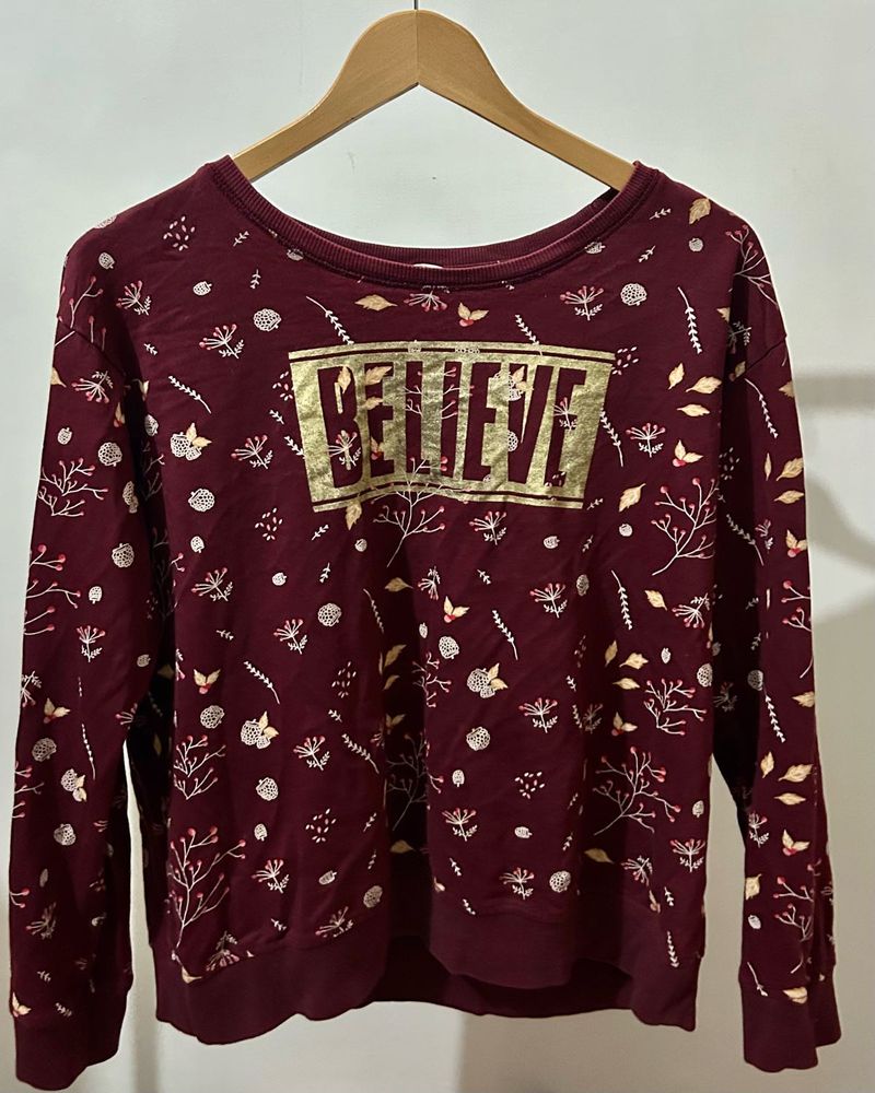 Maroon "Believe" Graphic Sweatshirt