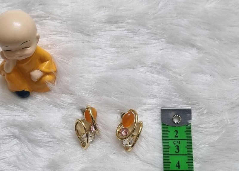 Elegant Gold Tone Earrings with Orange Stones