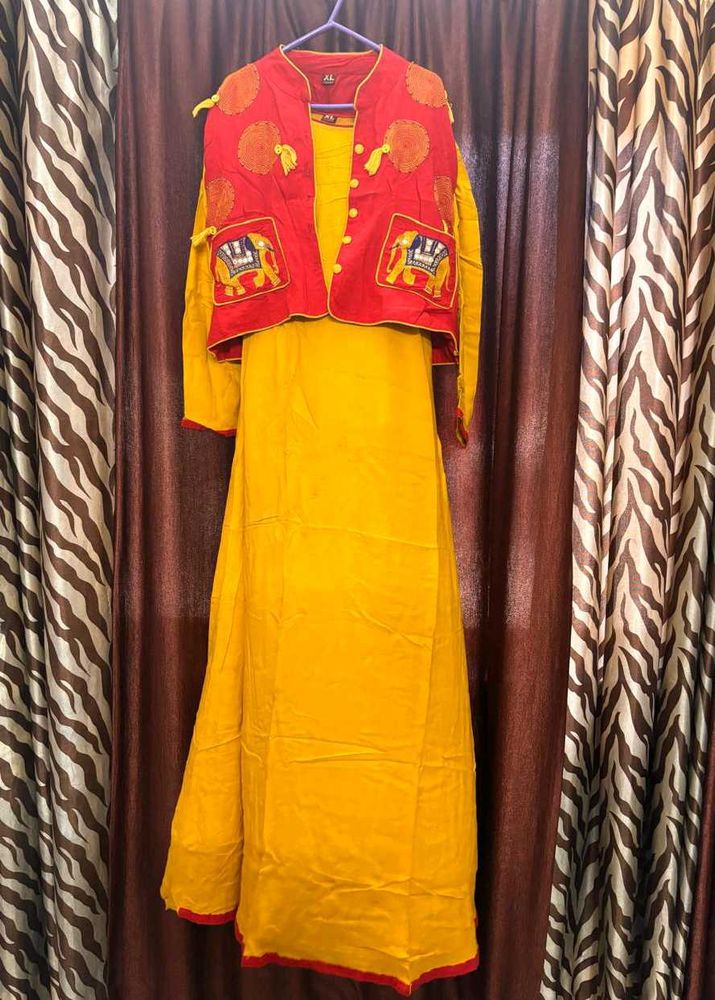 long yellow gown with red embroidered jacket