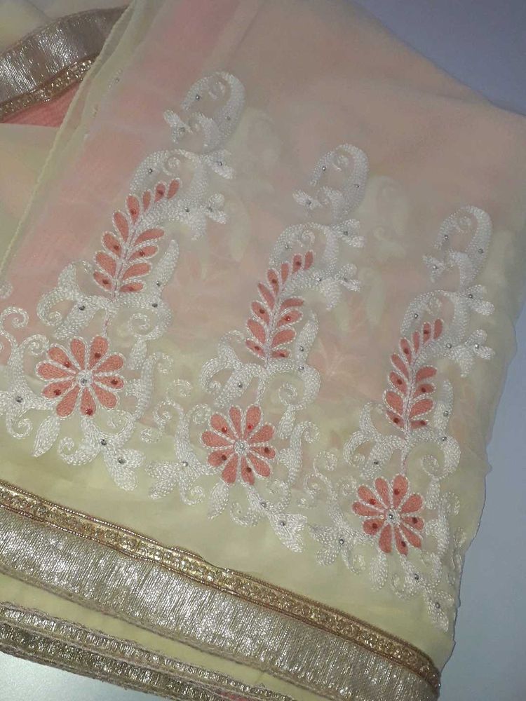 Cream Colour Saree With Light Orange Floral Design