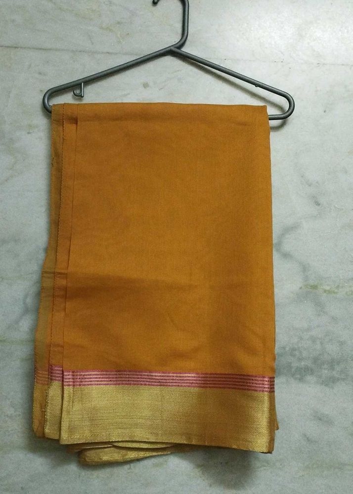 Mustard Color Saree With Gold Zari Border