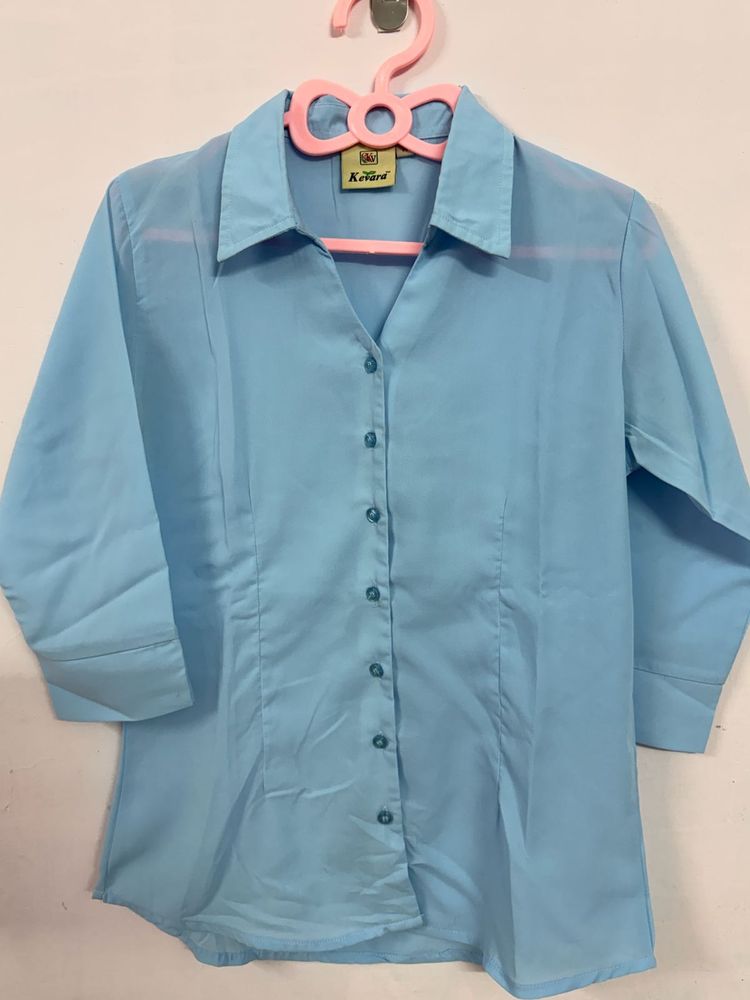 Light Blue Collared Button-Up shirt