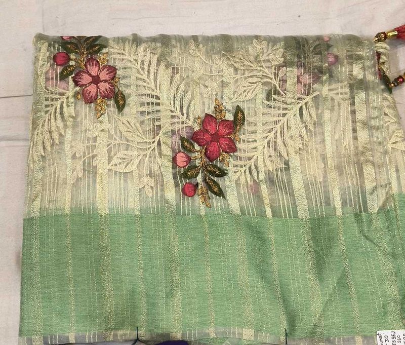 Embroidered brass saree