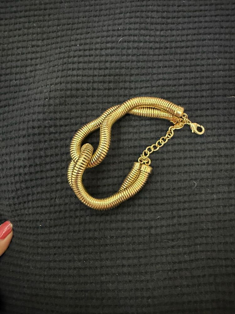 Chic Gold Tone Twisted Bracelet