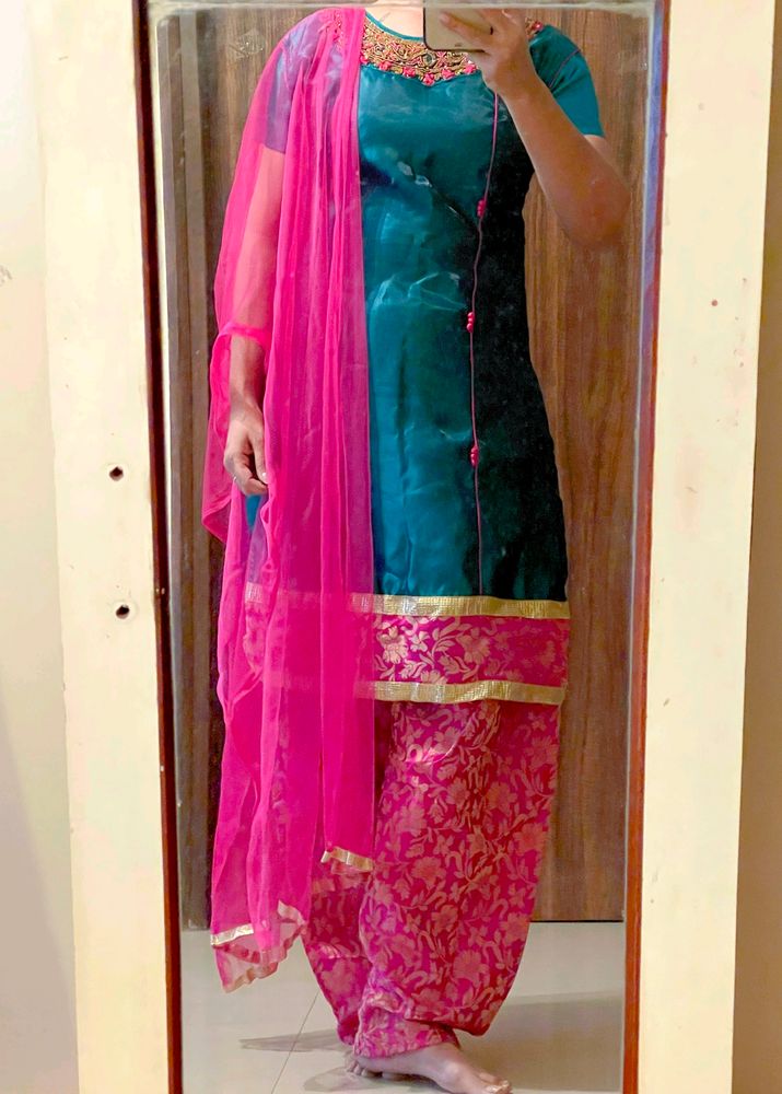Silk Patiala Suit With Neck Embellished And Net Du