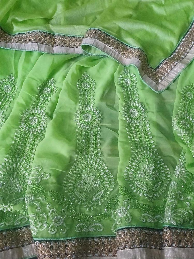 Stunning Green Embroidered Saree