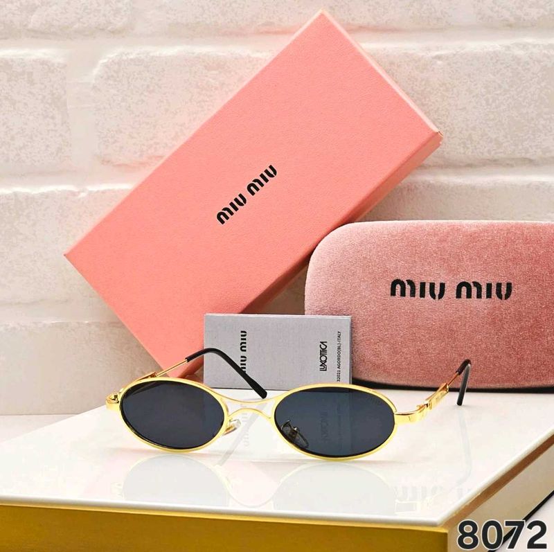 Miu Mi Oval Sunglasses