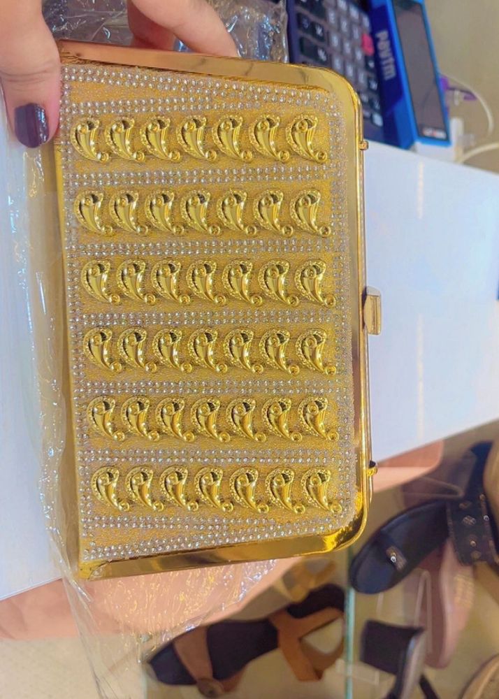 Elegant Gold Clutch with Embellishments