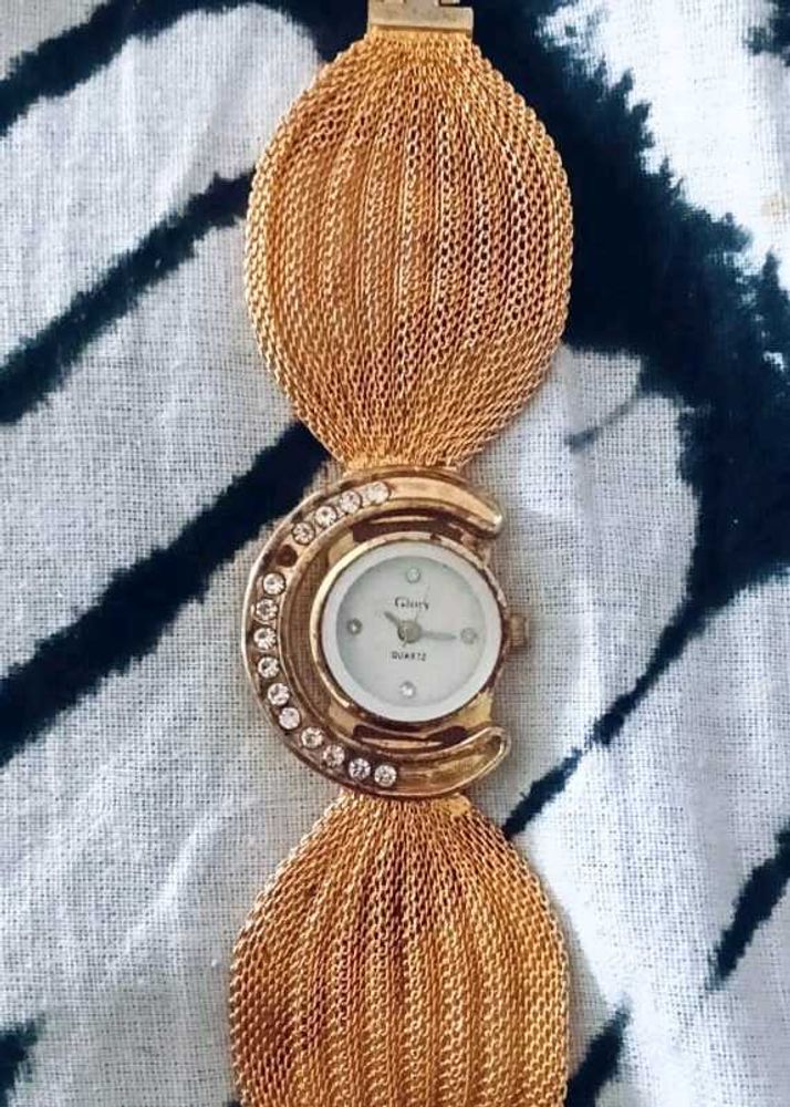 Elegant Gold Tone Moon Watch