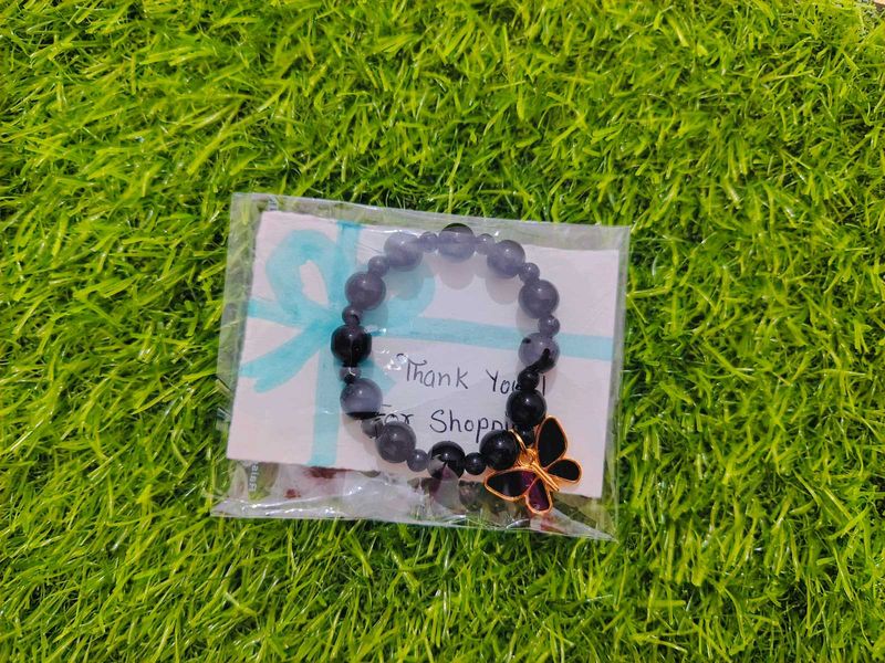 Elegant Beaded Bracelet with Butterfly Charm
