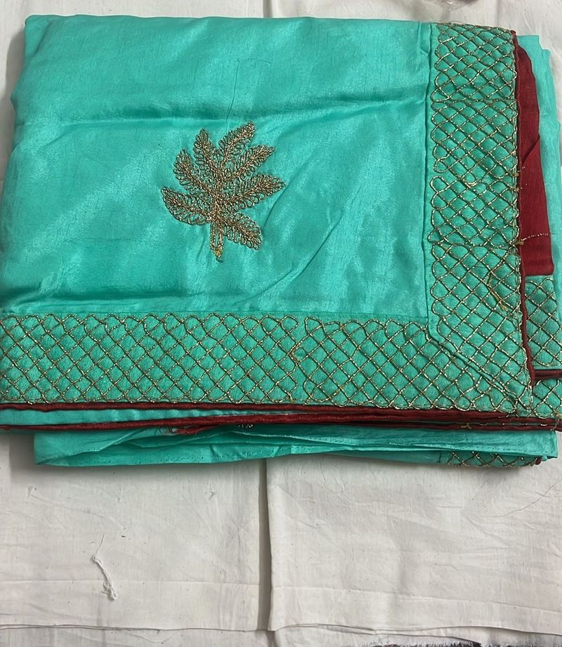 Elegant Teal Saree with Gold Embroidery