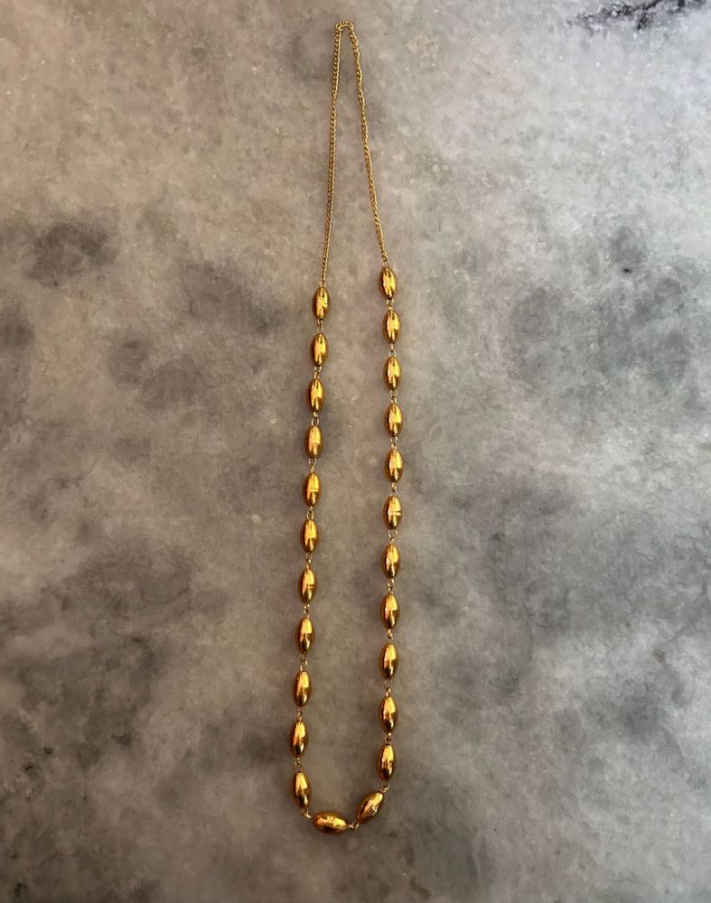 Elegant Gold Oval Bead Necklace