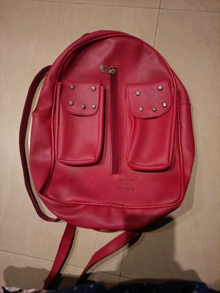 Red Backpack with Studded Pockets