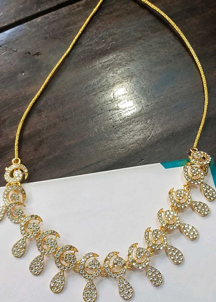 Elegant Gold Necklace with CZ Stones