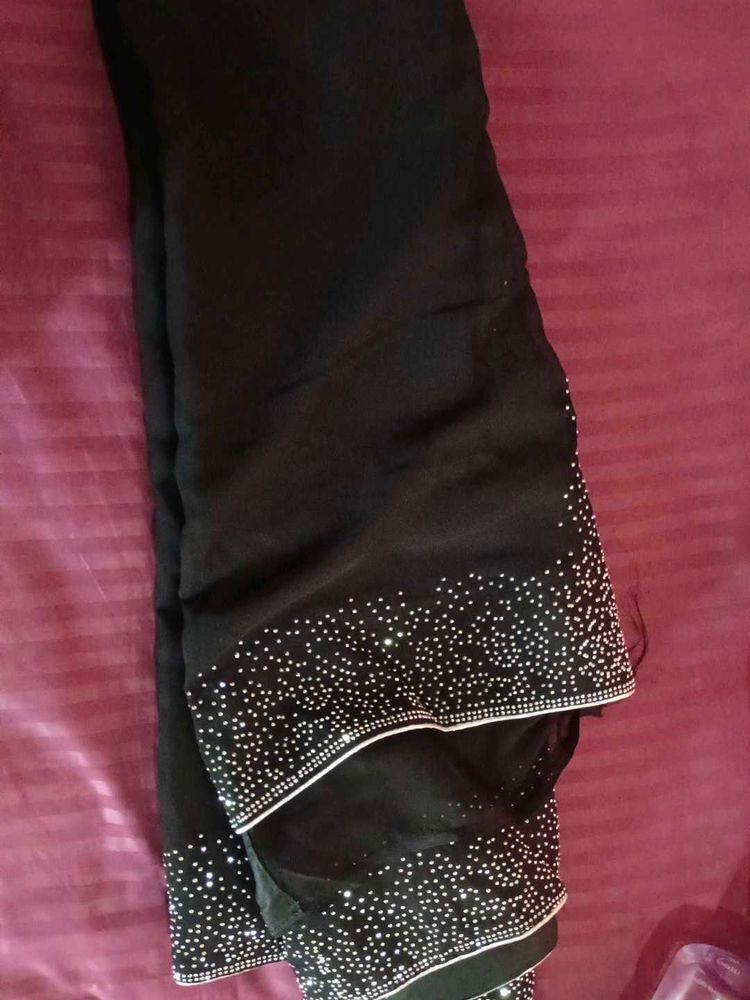 Stunning Black Saree with Crystal Embellishments