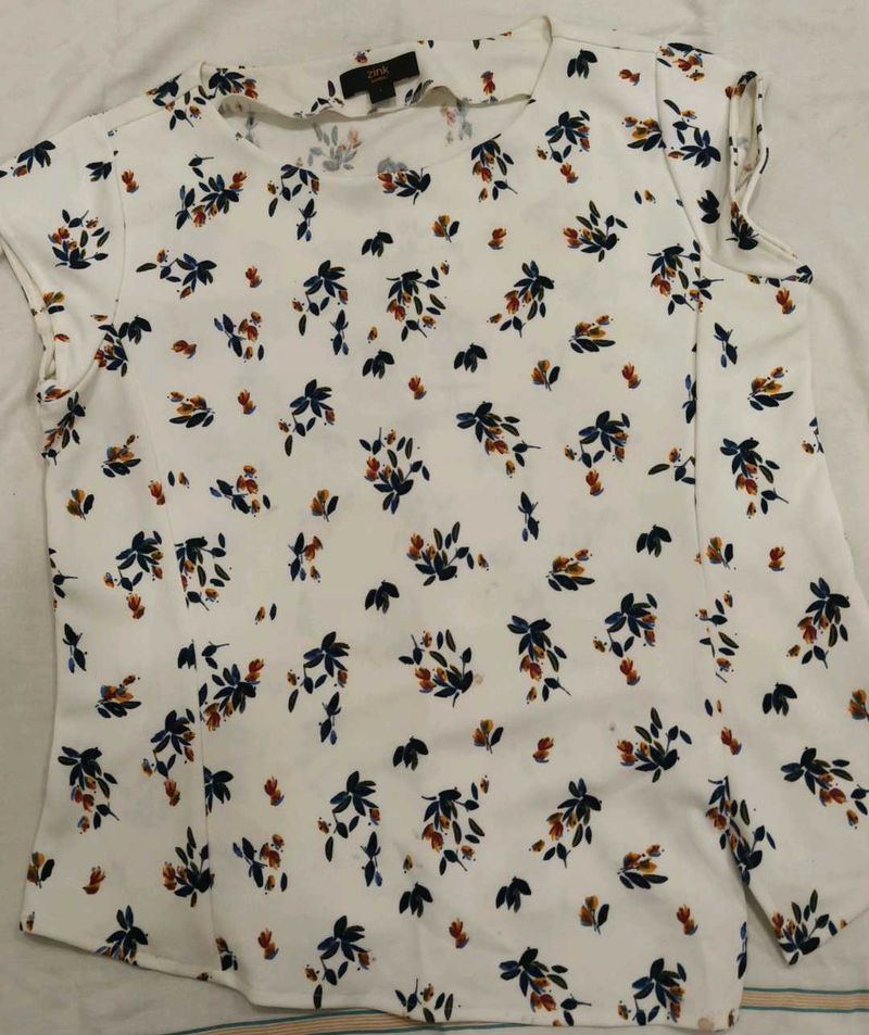 Looking for a trendy white top? Here it is