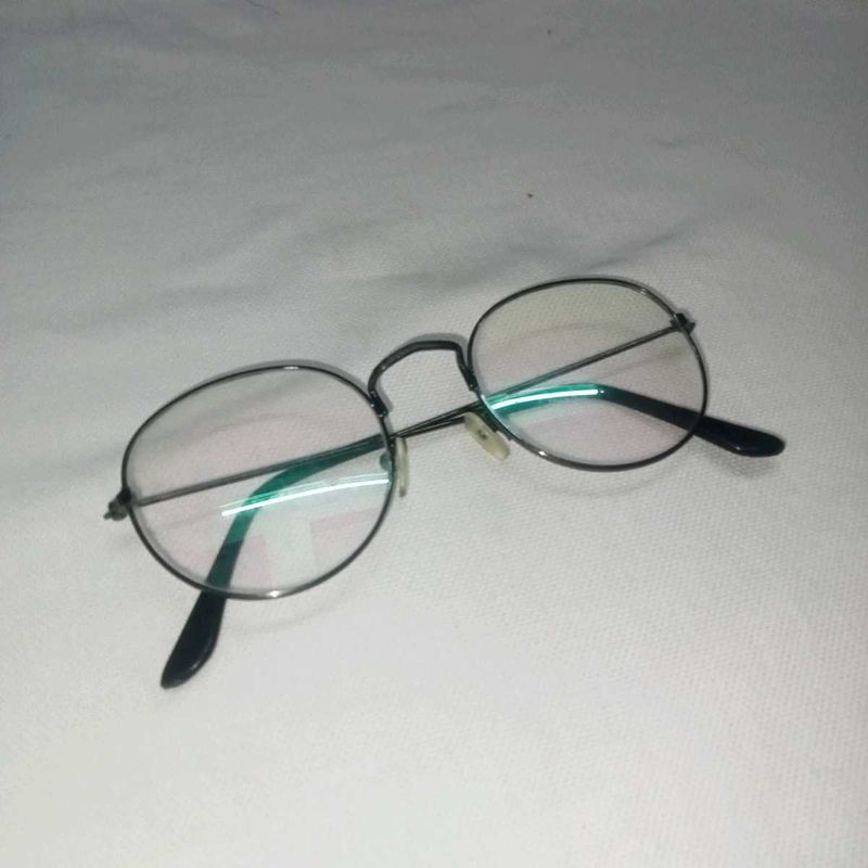 minimal round glasses.