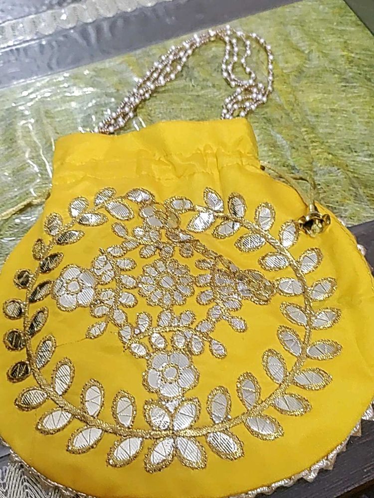 Vibrant Yellow Embroidered Potli Bag
