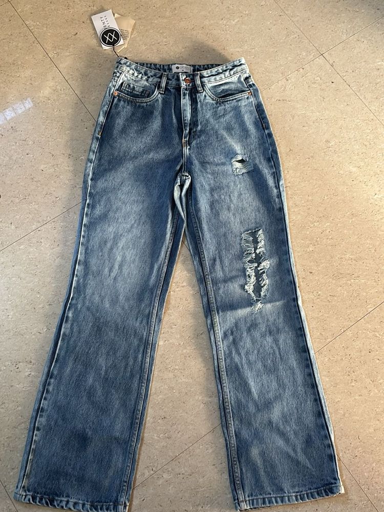 Distressed Blue Denim Jeans