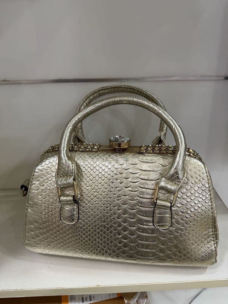 Elegant Gold Embossed Handbag