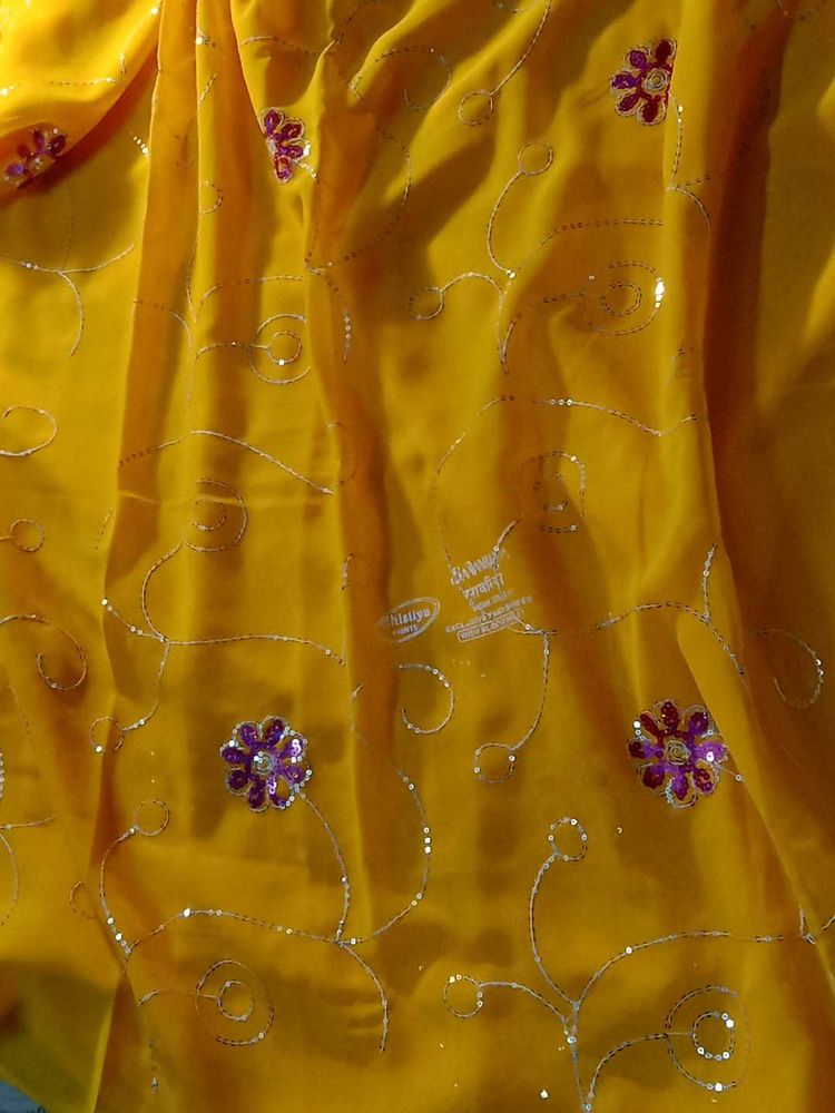 Vibrant Yellow Saree with Embellishments