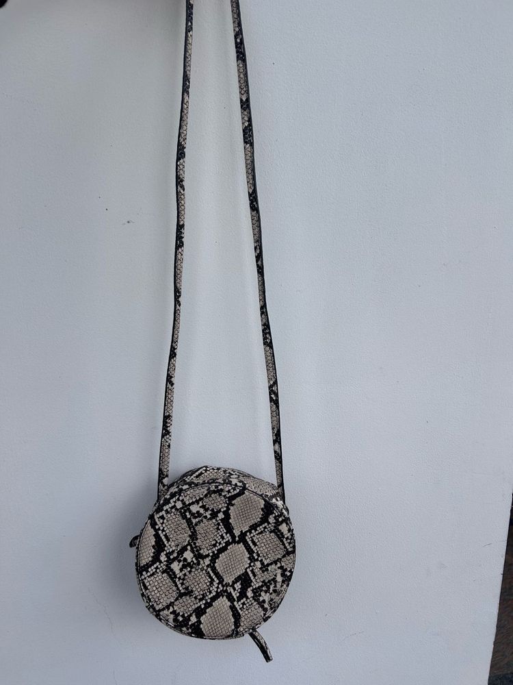 MANGO Round Snake Print Crossbody Bag