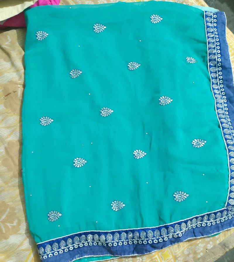 Elegant Teal Embroidered Saree
