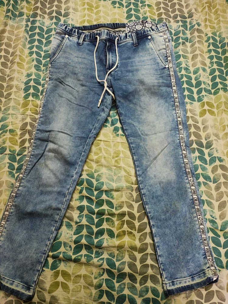 Stylish Acid Wash Jeans with Side Tape Detail