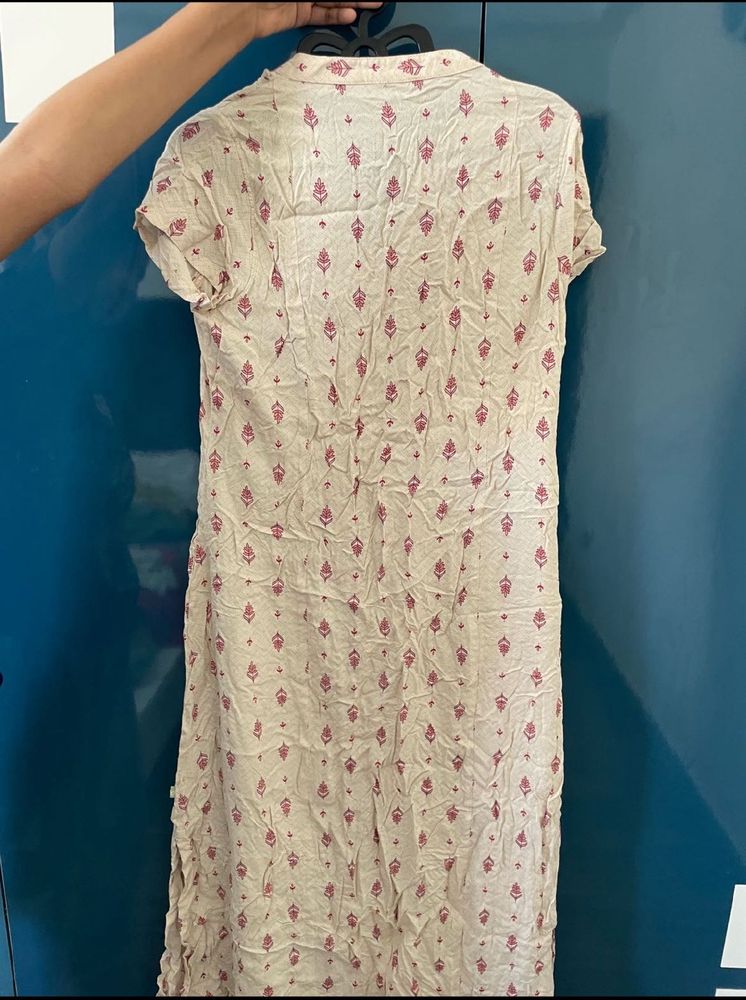 Cream embroidery kurti