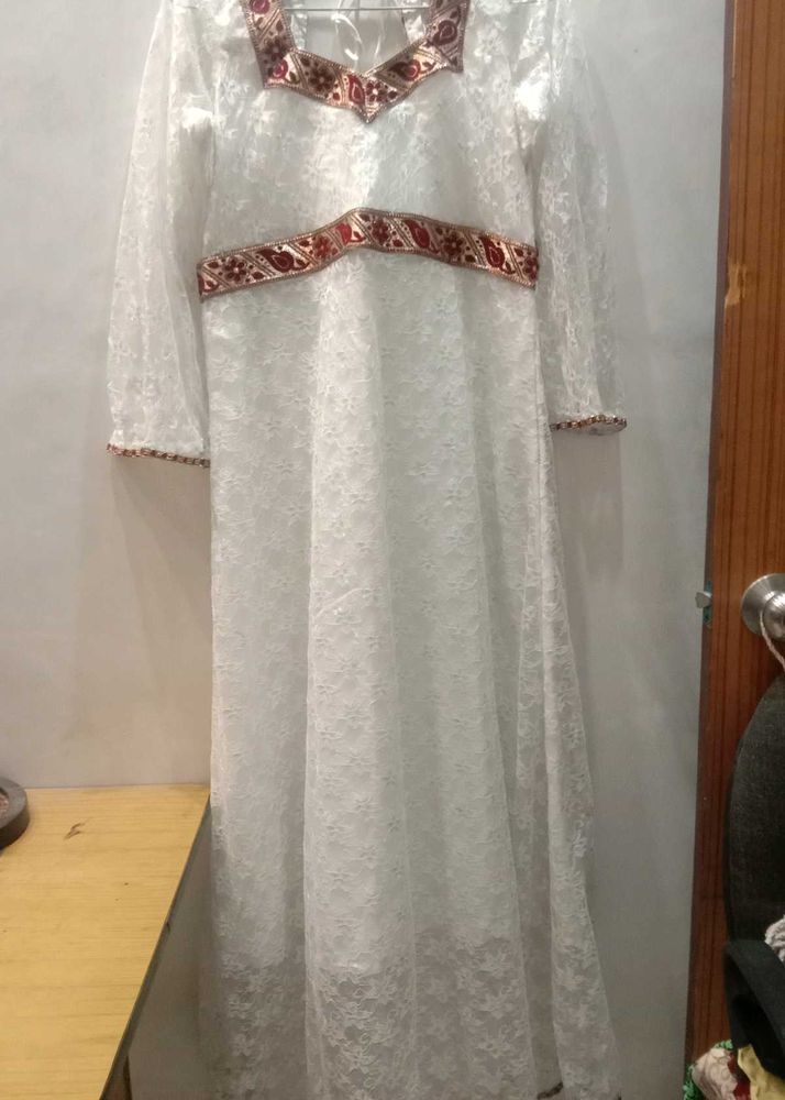 Elegant White Lace Gown with Red Trim