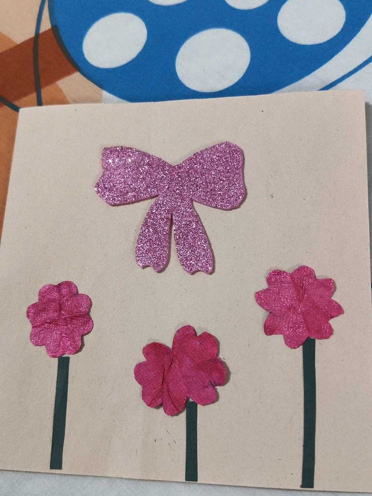 Bow, flower and heart greeting card