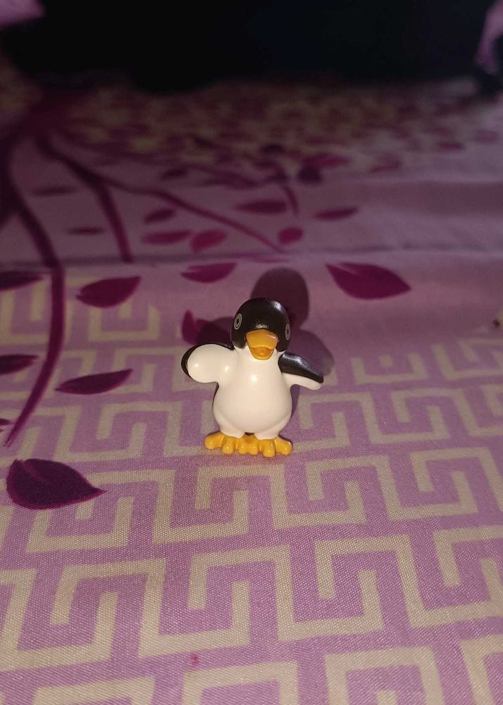 Penguin &amp; Rapunzel figurine