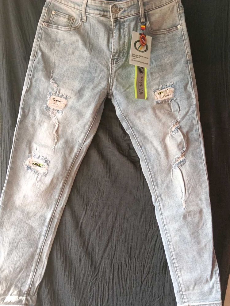 Light Wash Distressed Denim Jeans