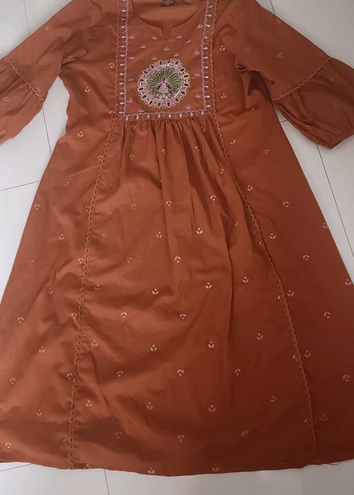 Orange Kurta with Peacock Embroidery