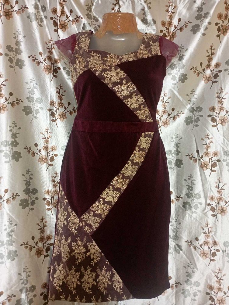 Burgundy  Gown with Gold Embellishments