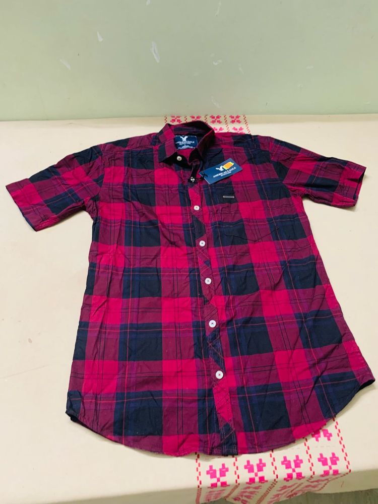 red check shirt with tag