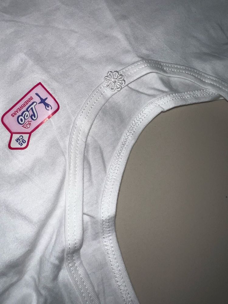 Cute White Camisole with Flower Detail