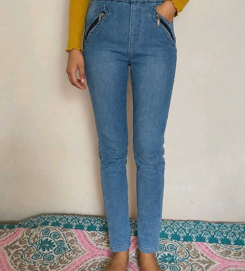 Light Blue Denim Jeans with Zipper Pockets