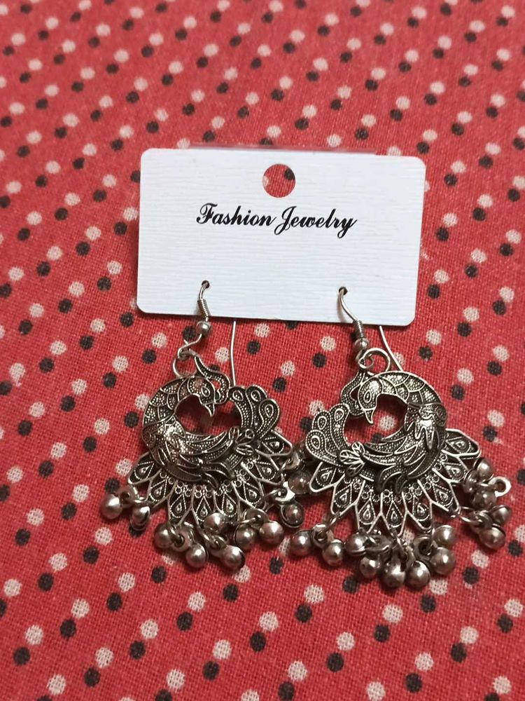 silver jhumkas