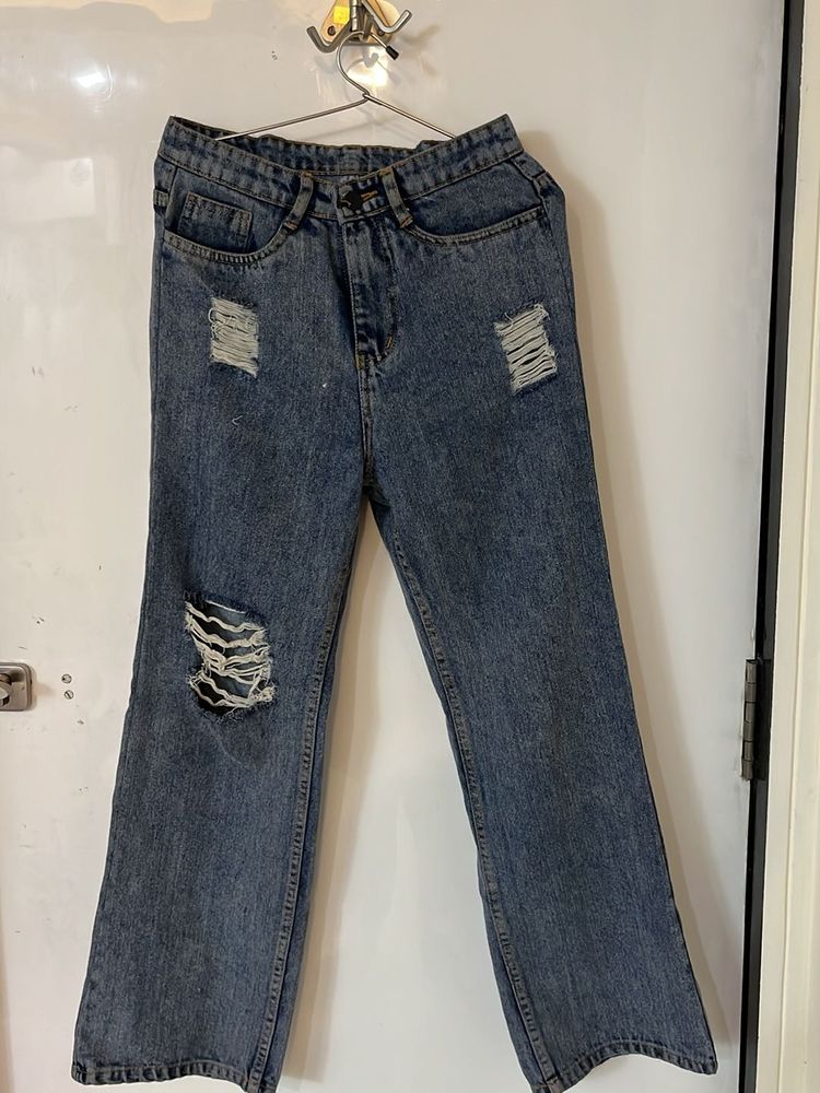 Distressed Blue Denim Jeans