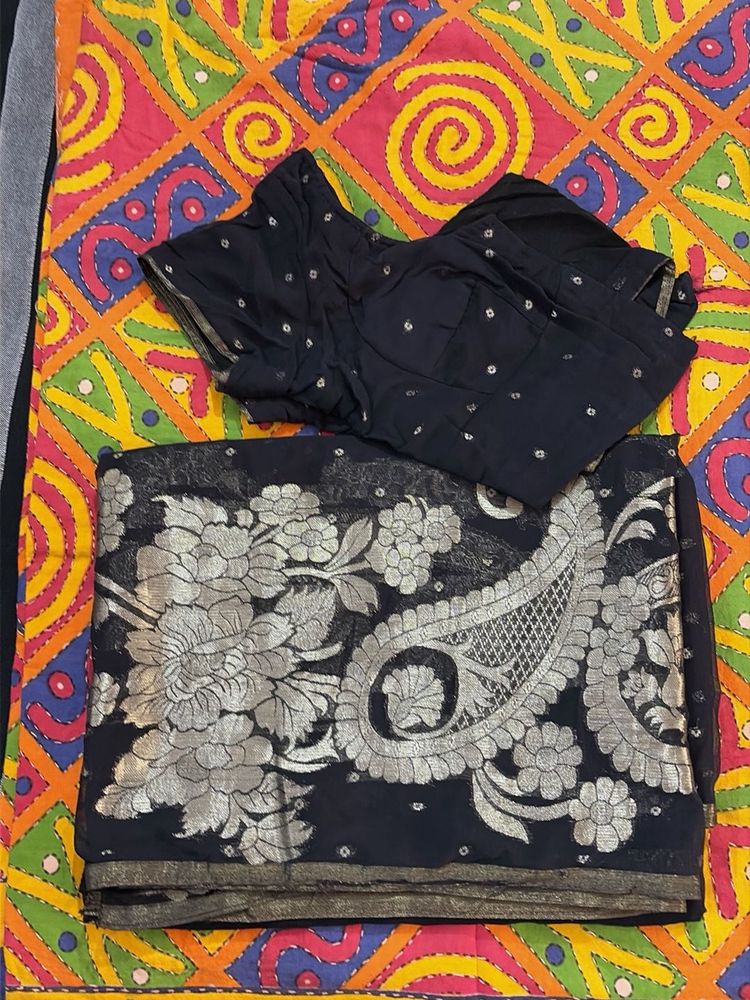 Elegant Black Saree with Silver Border