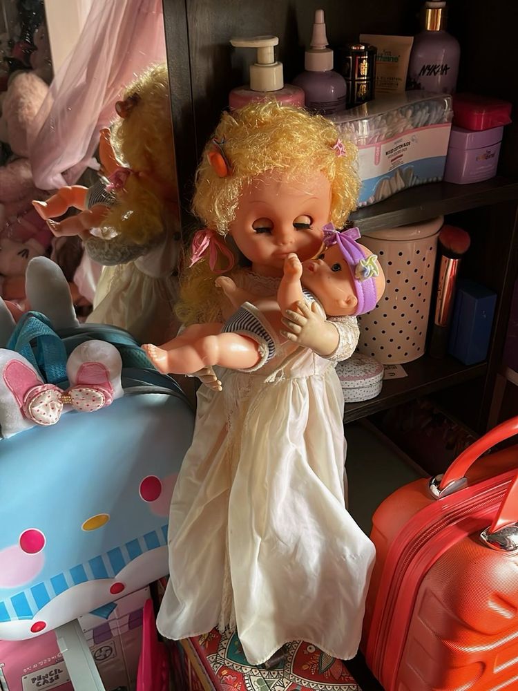Vintage Doll  ( eyes not working)