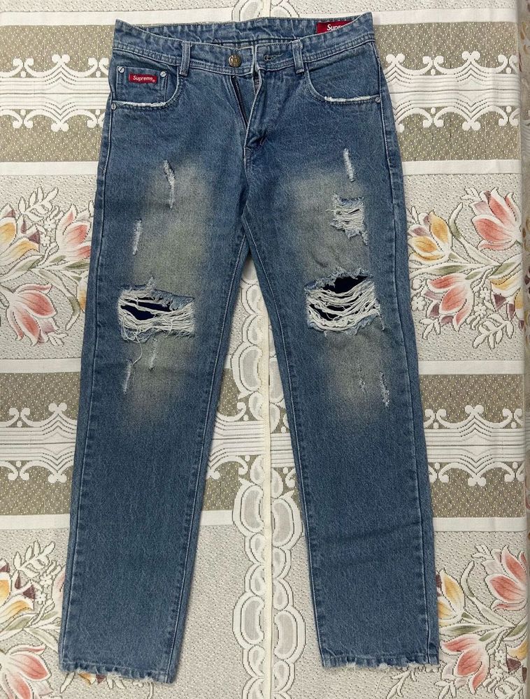 Supreme Distressed Blue Jeans