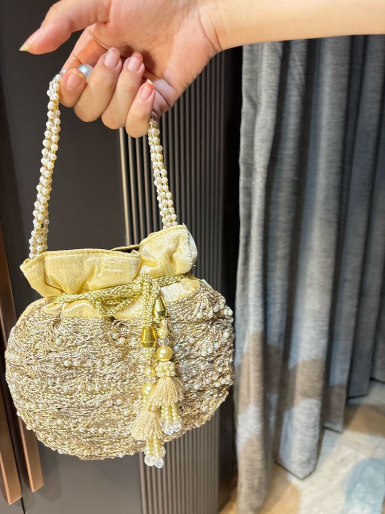 Elegant Gold Embellished Clutch