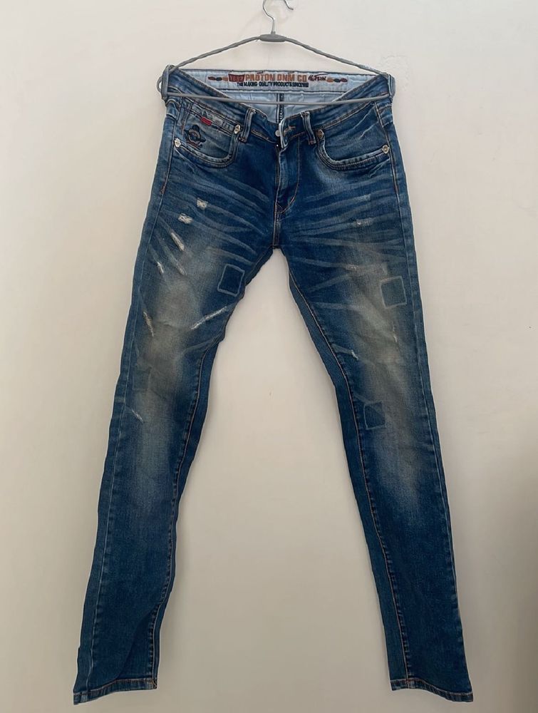 Distressed Denim Jeans